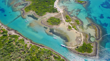 Aerial drone photo of exotic beaches with sapphire and turquoise clear waters, called the "Seychelles" of Greece, Lihadonisia island complex, North Evoia gulf, Greece