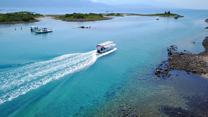 Aerial drone photo of exotic beaches with sapphire and turquoise clear waters, called the 