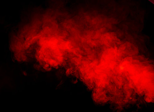 Red smoke on black