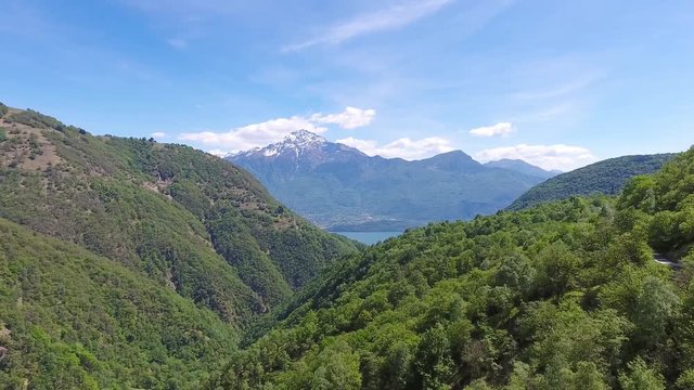 Aerial landscape on Como lake between mountains in Italy, 4k
