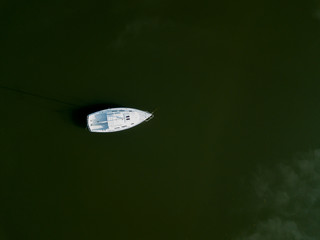 Birdseye View of a Sailboat in Open Water