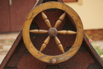 Decorative wheel on the well