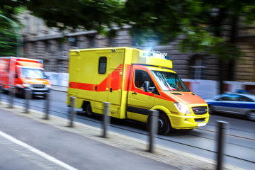 ambulance car speeding on city streets
