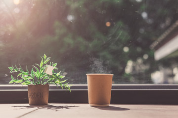 Hot Coffee on the Table Near the Window in Sunshine Day