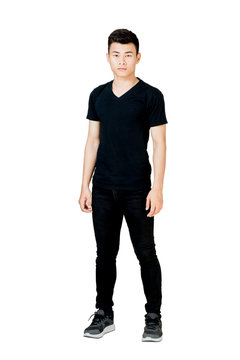 Portrait of a man standing in black t-shirt and black jeans. Isolated full length on white background with copy space and clipping path
