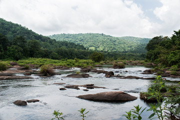 River flowing through rocks in India Kerala.