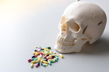 Skull model, Pharmaceutical Drugs and Heart health for education in laboratory.