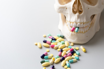 Naklejka premium Skull model, Pharmaceutical Drugs and Heart health for education in laboratory.