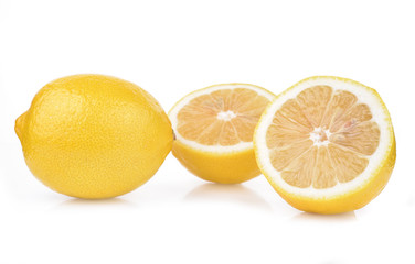 Fresh lemon with half isolated on white background