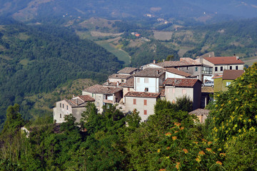 Fototapeta na wymiar Stone houses a small village on the hillside