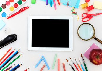 School set with notebooks, pencils, brush, scissors and apple on white background