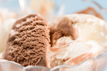 Closeup macro vanilla chocolate ice cream in the bowl