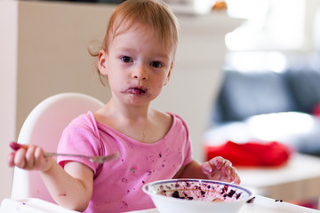 2 years old girl child is eating