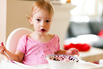 2 years old girl child is eating