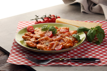 Ravioli with tomato sauce and basil