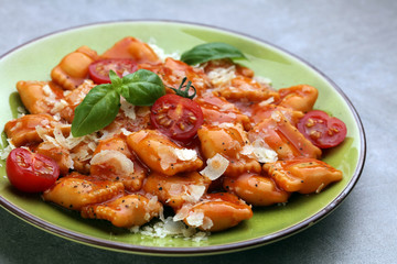 Ravioli with tomato sauce and basil