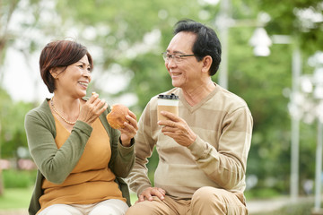 Enjoying coffee in park