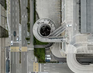 Papier Peint photo autocollant Helix Bridge Aerial view of spiral bridge to rooftop carpark