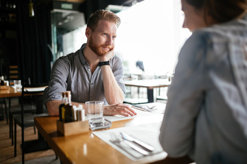 Couple dating in restaurant