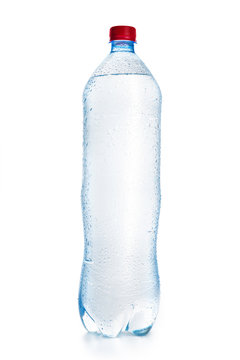 Plastic bottle of clear water with water drops