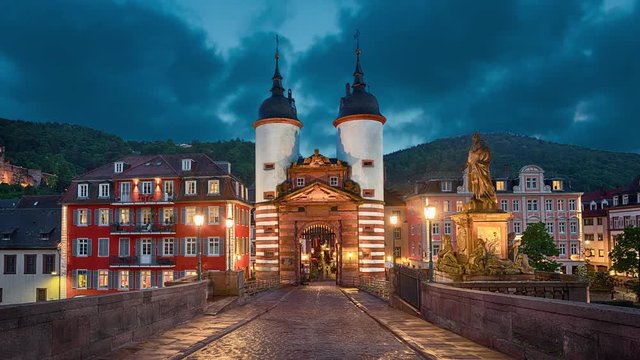 Illuminated Old Bridge Gate on Karl Theodor Bridge in Heidelberg, Baden-Wurttemberg, Germany
