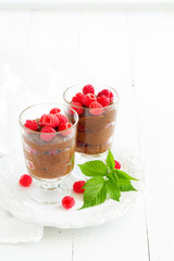 Chocolate mousse with raspberries. Selective focus.