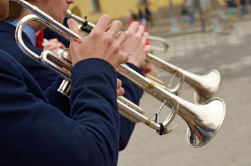 Playing a musical pipe.