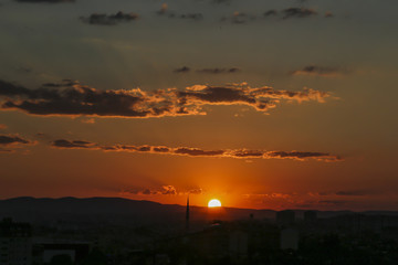 Sunset over Ankara Turkey skies. beautiful landscape with a red sunset sky over the field 