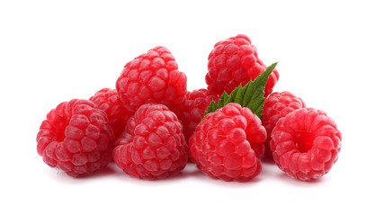 ripe raspberries with green leaf isolated on white background macro