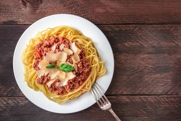 Pasta bolognese on rustic background with copyspace
