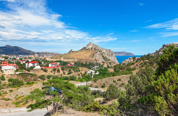 View of the resort town of Sudak on the coast of the Black sea from Genoese fortress on the mountain Cenevez Qaya