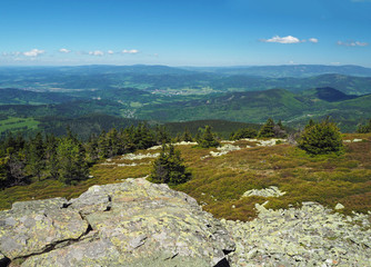 view from rocky formation in Jeseniky mountain - hills, trees, villages