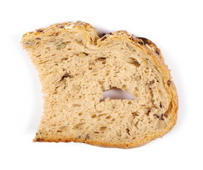 Whole wheat bread slice without additives, isolated on white background, top view