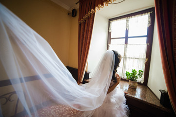 Beautiful bride with bouquet before wedding ceremony
