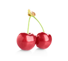 Fresh ripe cherries on white background