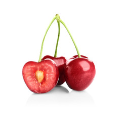 Fresh ripe cherries on white background