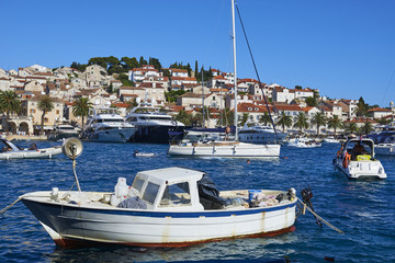 Fototapeta na wymiar Hvar harbour in old town Hvar. Hvar is very popular tourist destination on Dalmatia of Croatia. 