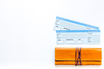 Preparing for trip. Tickets on white background top view copyspace