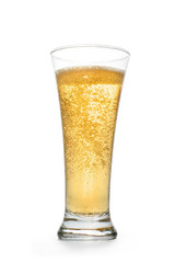 Golden sparkling drink into high glass