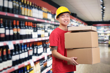 Wine department in supermarket, blurred background