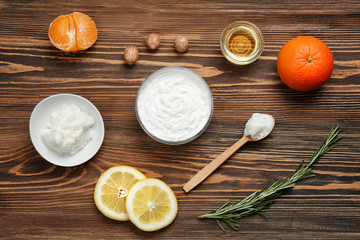 Beautiful composition with shea butter in jar on table