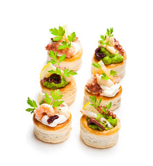 Vol-au-vents  puff pastry cases filled with salted squid and octopus