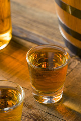 Alcoholic Brown Rum in a Shot Glass