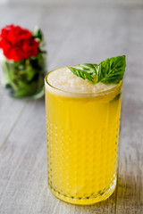 Persian Saffron Milkshake with basil leaves.