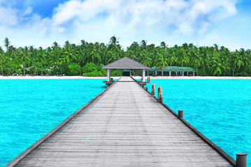 Wooden pontoon at tropical resort on summer day