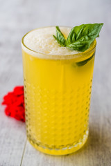Persian Saffron Milkshake with basil leaves.