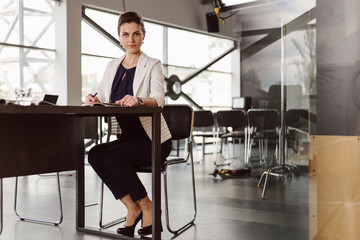 Beautiful businesswoman at the co-working