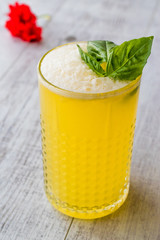Persian Saffron Milkshake with basil leaves.