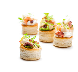 Vol-au-vents  puff pastry cases filled with salted squid and octopus