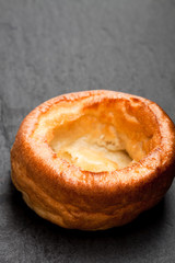 Yorkshire  pudding isolated on black stone background